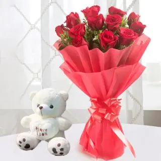 Bunch of 12 red roses with 6 inch white teddy bear