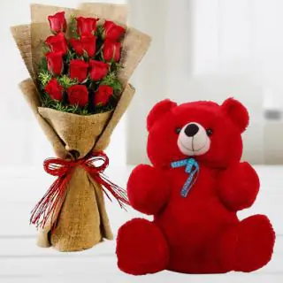 valentine Bunch of 12 red roses in jute packing with 1 feet height red teddybear
