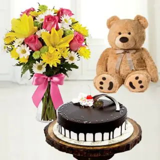 mix flowers in glass vase with choco vanilla cool cake with 6 inch teddybear