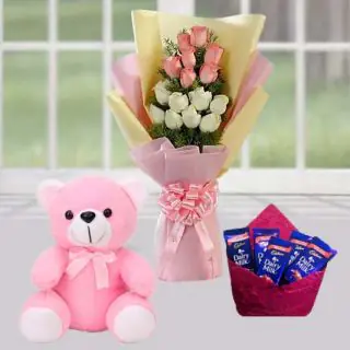 Bunch of pink and white roses with pink teddybear with pack of 5 dairy milk chocolates 