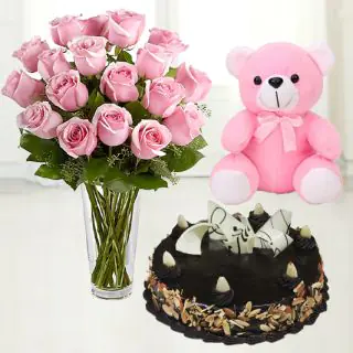 12 pink roses in glass vase with chocolate almond cake with 6 inch height teddybear 