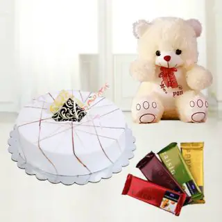  vanilla cake with 4 temptations chocolate with 1 feet height teddybear