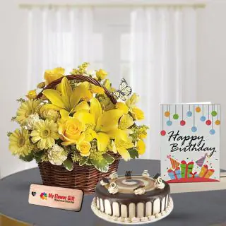 Beautiful Basket Arrangement of yellow mix flowers with half kg coffee cake with birthday card 