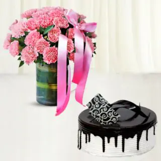 20 pink carnations arranged in glass vase with premium quality choco vanilla cake 