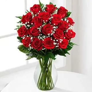 20 red roses in glass vase 