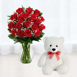 15 red roses in glass vase with 6 inch white teddy bear 