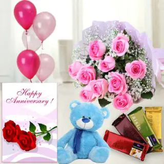 10 pink roses bunch ,  6 inch teddybear , set of 4 temptations chocolates, anniversary greeting card with 5 blown balloons  