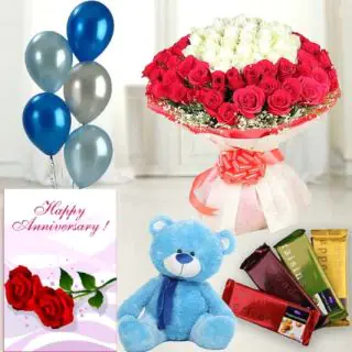 100 red and white roses,  6 inch teddybear , set of 4 temptations chocolates, anniversary greeting card with 5 blown balloons 