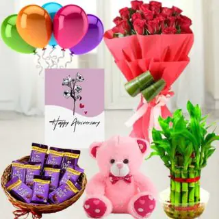 Bunch of 12 red roses with jute packing , basket of assorted chocolates, 6 inch height teddybear , 2 layer Lucky bamboo plant ,5 blown balloons with anniversary greeting card