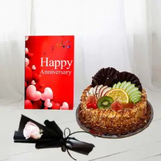 Half kg Premium butterscotch fruit cake, single white rose, anniversary card 