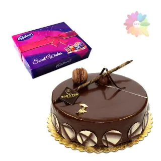 chocolate fantasy cake with box of celebration chocolates 