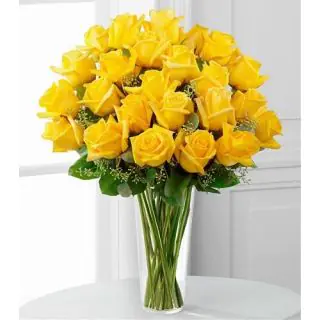 20 yellow roses in glass vase 