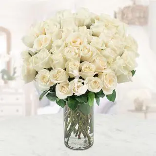 40 white roses in glass vase 