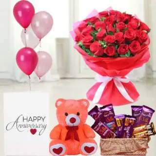 Bunch of 20 red roses,  6 inch teddybear, Basket of 7  dairy milk silk chocolates with 2  Fivestar, anniversary   greeting card with 5 blown balloons