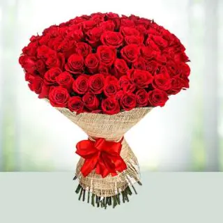 50 red roses bouquet with jute packing 