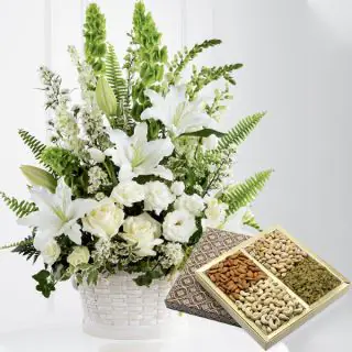 Exotic basket arrangement of lilies&roses with 1 kg assorted dryfruits 