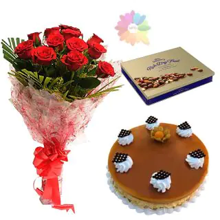Bunch of 12 red roses with butterscotch cake with box of cadburys premium chocolates 
