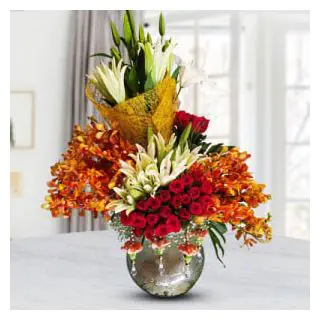 Beautiful Exotic Vase Arrangement full of roses, lilies, with mocra orchids