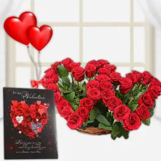 Beautiful twin shape heart arrangement of red roses with pair of heart shape balloons with valentine day card 