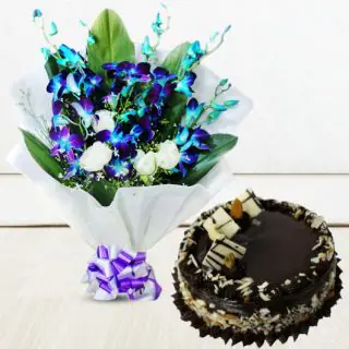 Bouquet of blue orchids with white roses with chocolate cake 