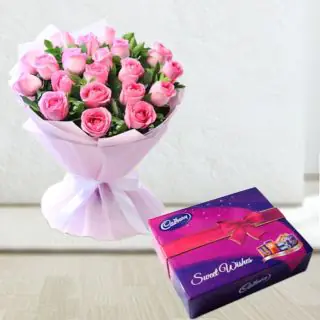 Bunch of 10 pink roses with box of celebration chocolates 