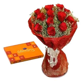Bunch of 12 red roses with box of celebration chocolates 