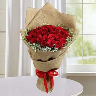 Bunch of 30 red roses with jute packing 