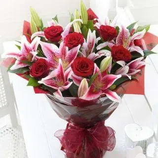 Bunch of 5 pink lilies with 10 red roses 