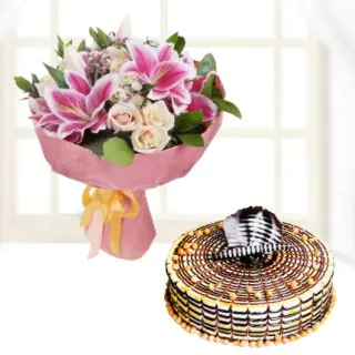 Bunch of mix flowers with butterscotch cool cake 