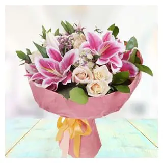 Bunch of pink lilies with white roses 