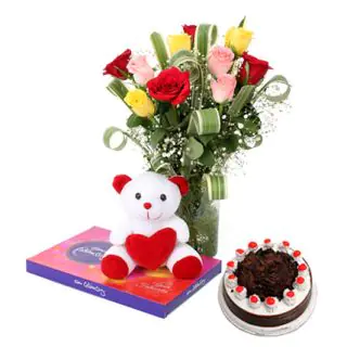 12 mix roses in glass vase with 1 pound blackforest cake, celebration chocolate box along with 6 inch cute teddy