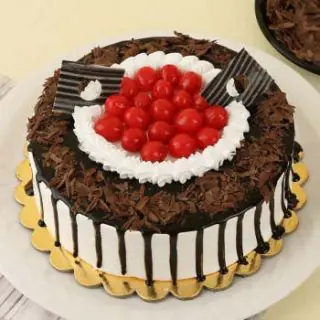 premium quality black forest cool anniversary cake with cherry topping 