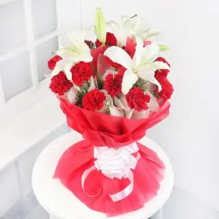 Bunch of white lilies and red anthuriums