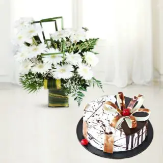Vase arrangement of 15 white gerberas with choco vanilla cool cake 