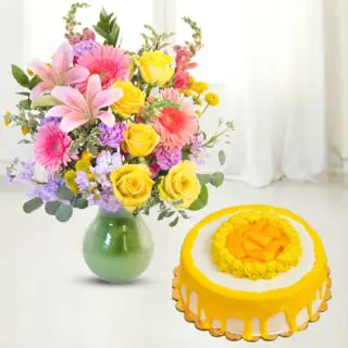 vase arrangement of 20 mix flowers with mango cool cake 