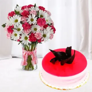 Vase arrangement of carnations and gerberas with strawberry cool cake 