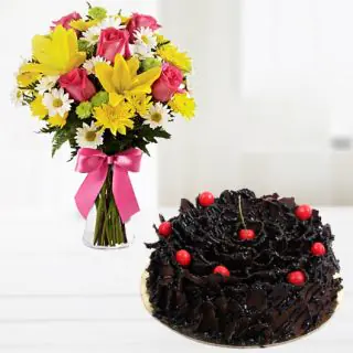 Vase arrangement of mix flowers with chocolate fantasy cake 