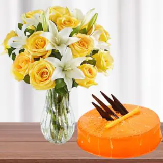 Vase arrangement of yelow roses with white lilies with half kg orange cool cake