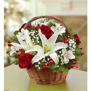 Basket arrangement of red roses with white lilies