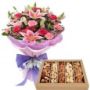 bunch of mix flowers with assorted dryfruits
