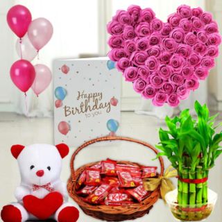 Heart shape arrangement of 30 pink roses, 6 inch height teddybear , Basket of 20 kitkat chocolates, 2 layer Lucky bamboo plant ,5 blown balloons with birthday greeting card