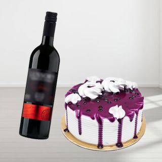 blueberry premium quality cake with bottle of red wine