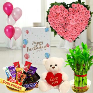 40 pink roses heart shape arrangement , 6 inch white teddybear, Basket of assorted chocolates, 2 layer Lucky bamboo plant ,5 blown balloons with with birthday greeting card