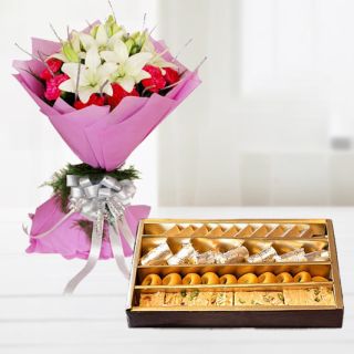 Bunch of exotic mix flowers with Half kg assorted sweets