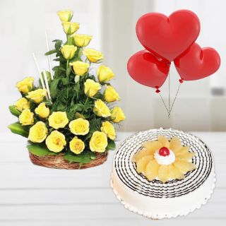 Basket of 12 yellow flowers with pineapple fresh cream cake with 3 heart shape balloons 