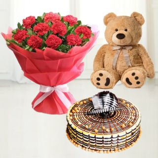 Bunch of 15 red carnations with 6 inch cute teddy bear with butterscotch fresh cream cake