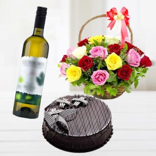 Basket arrangement of mix roses with black forest cake with bottle of white wine 