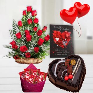 Basket Arrangement of 15 red roses, 1 kg heart shape chocolate cake, pack of 5 kitkat chocolates , greeting card with 2 heart shape balloons 