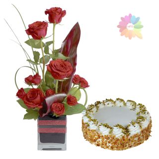 12 red roses arranged in glass vase with 1 pound butterscotch fresh cream cake