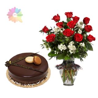 12 red roses arranged in glass vase with 1 pound chocolate fantasy cake 